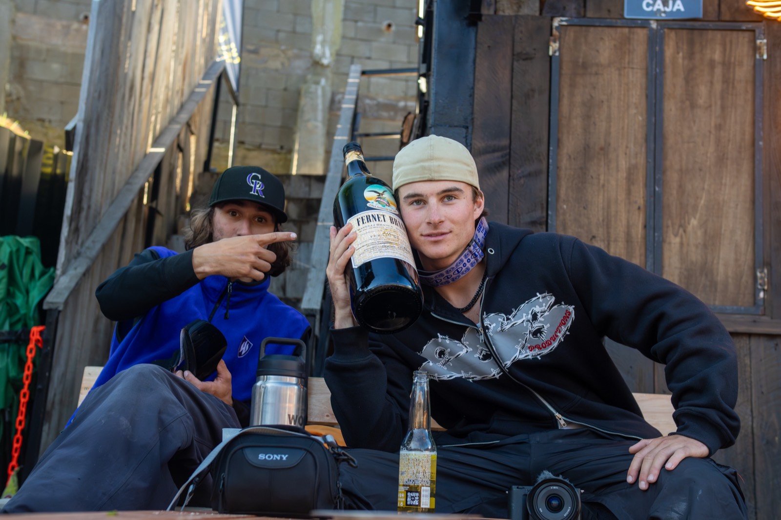 Two foreigners enjoying Fernet in a bar in Bariloche, Argentina