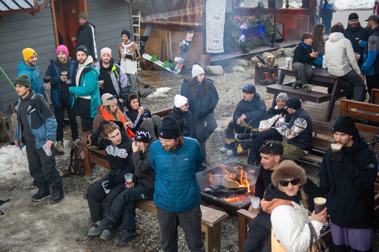 Local skiers and snowboarders enjoying the after-ski party